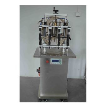 Stroj na plnění parfémů se 4 hlavami